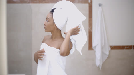 Woman-With-Towel-On-Head-In-The-Bathroom