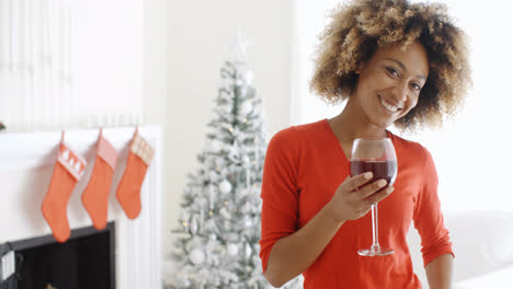 Young-woman-offering-a-Christmas-toast