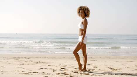Fitness-Young-Woman-Standing-On-Beach