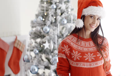 Pretty-young-woman-celebrating-Christmas-at-home