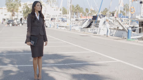 Business-Woman-Stand-In-Yacht-Club