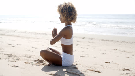 Woman-Meditation-On-Beach