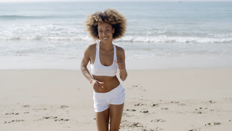 Woman-Jogging-On-The-Beach