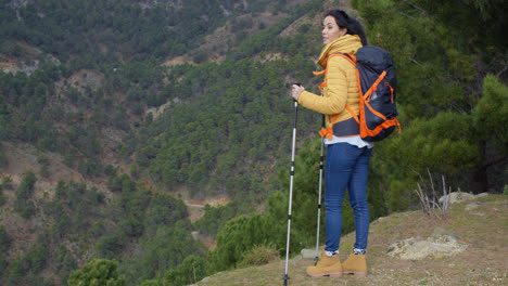 Young-woman-enjoying-a-mountain-hike
