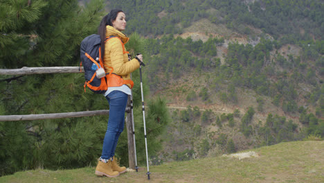 Young-woman-hiking-on-a-mountain-plateau