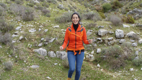 Vivacious-woman-enjoying-a-mountain-hike