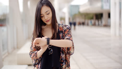 Young-woman-checking-her-wristwatch