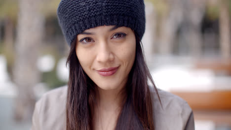 Pretty-thoughtful-young-woman-in-a-woolly-cap