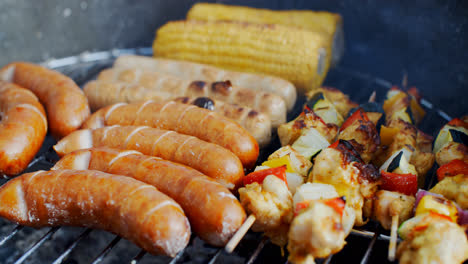 Sausages--corn-and-veggie-kebabs-on-a-BBQ