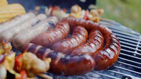 Sausages-and-vegetables-cooking-on-grill