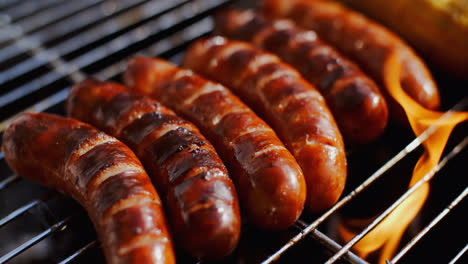 Tasty-juicy-sausages-grilling-over-a-fire