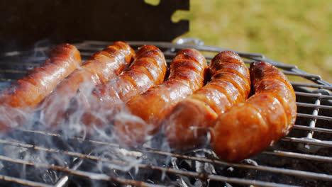 Thick-juicy-sausages-grilling-on-a-fire