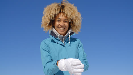 Cute-woman-in-frizzy-hair-and-winter-coat