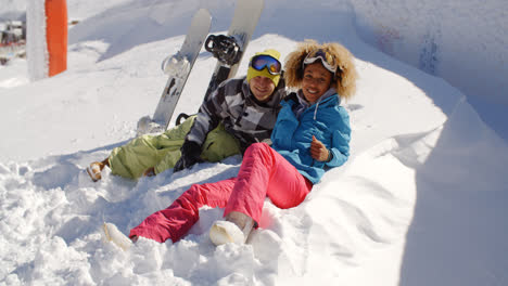 Young-couple-enjoying-their-winter-vacation