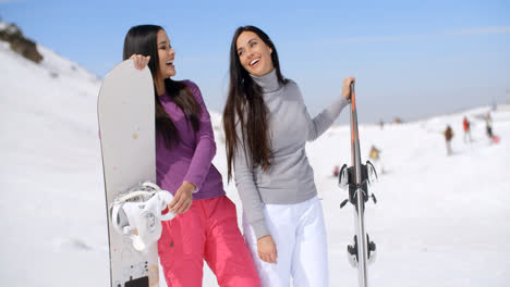 Two-attractive-female-friends-at-a-ski-resort
