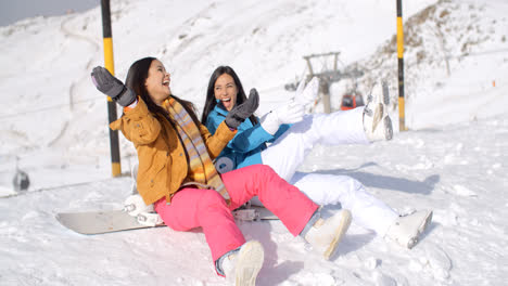 Two-happy-young-women-enjoying-a-winter-holiday