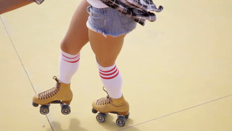 Young-woman-roller-skating-outdoors