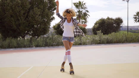 Pretty-young-woman-practising-her-roller-skating