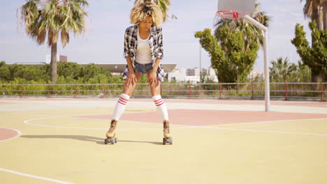 Woman-in-roller-skates-on-basketball-court