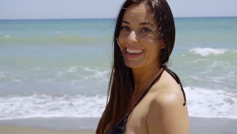 Gorgeous-happy-woman-on-a-tropical-beach