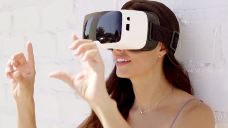 Young-woman-wearing-virtual-reality-goggles