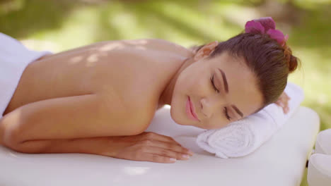 Lovely-young-woman-relaxing-at-a-spa