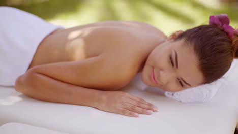 Smiling-happy-young-woman-having-a-spa-treatment