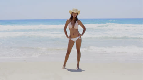 Gorgeous-sexy-young-woman-walking-on-a-beach