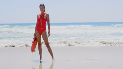 Beautiful-lifeguard-wearing-red-swim-suit