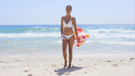 Beautiful-young-woman-in-a-bikini-on-the-beach