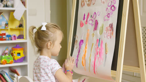 Artistic-little-girl-painting-a-creative-design