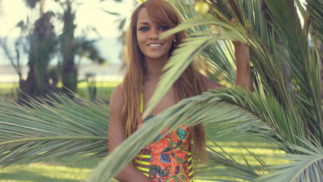 Smiling-young-woman-enjoying-a-tropical-vacation