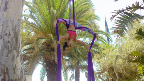 Young-gymnast-working-on-her-acrobatic-dance