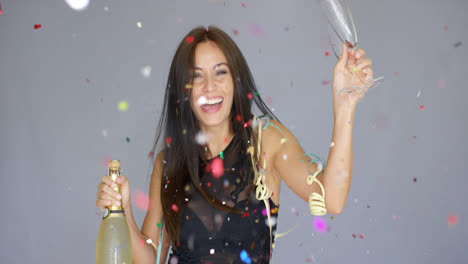 Laughing-vivacious-woman-celebrating-the-New-year