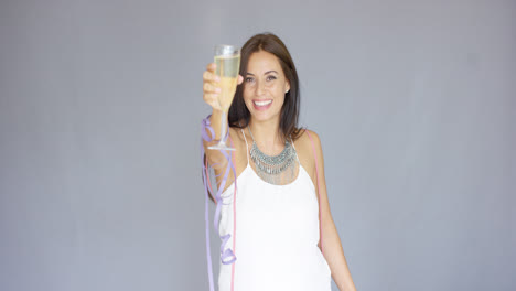 Beautiful-chic-young-woman-toasting-the-New-Year