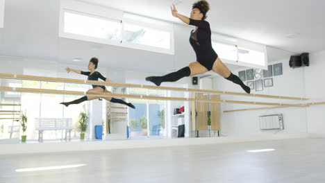 Fit-athletic-young-dancer-leaping-in-the-air