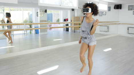 Sexy-african-american-woman-dancing-with-VR-glasses
