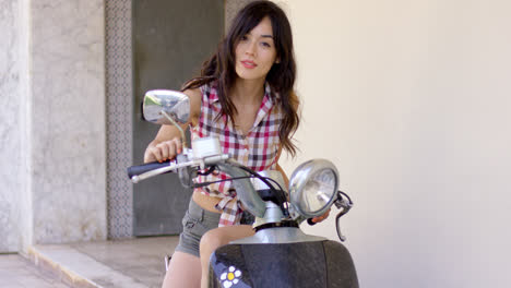 Attractive-young-woman-on-a-motorcycle