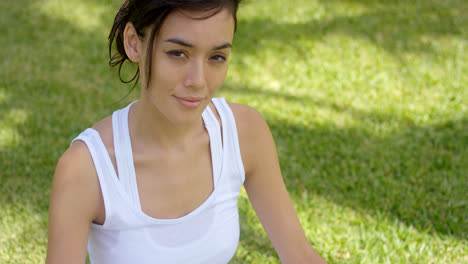 Beautiful-young-woman-in-white-shirt-with-grin