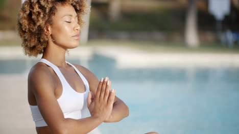 Woman-Sitting-In-Meditating-Position