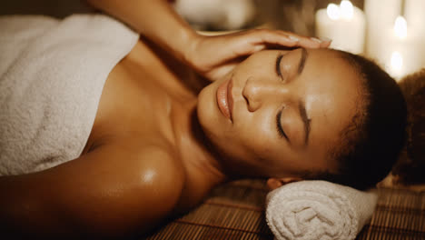Woman-Lying-In-Spa-With-Closed-Eyes