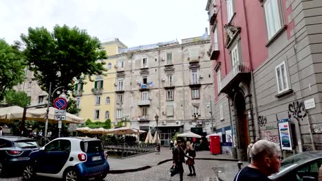 Busy-city-center-street-with-people-walking-in-Naples