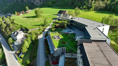 Hotel-Union-Geiranger-garden-exterior-and-tourists-relaxing-in-pool---Aerial