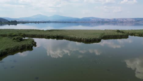Ioannina-and-Pamvotis-Lake-Water-Mirror-in-Epirus,-Greece-Mainland--Aerial