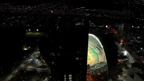 SAN-JOSE,-COSTA-RICA---MARCH-28,-2023:-time-lapse-aerial-drone-view-of-the-breathtaking-Estadio-Nacional-at-La-Sabana-Metropolitan-Park
