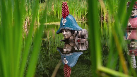 Napoleon-statue-in-deep-swamp-water-with-changing-light,-time-lapse-view