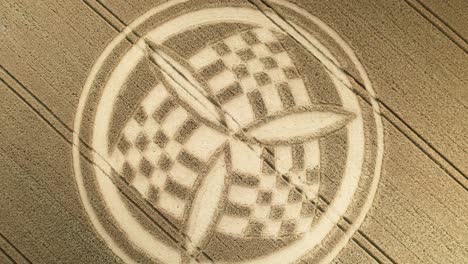 Aerial-view-rising-over-golden-Hampshire-unique-trinity-crop-circle-wheat-field-in-South-Wonston-2023