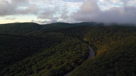 An-aerial-view-on-a-cloudy-morning-over-Storm-King-Mountain,-located-on-the-west-bank-of-the-Hudson-River-in-NY