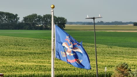 North-Dakota-state-flag-waving-in-front-of-corn-field