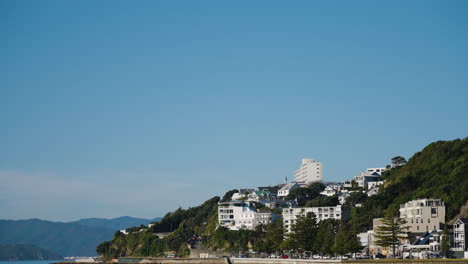 Slow-motion-revealing-shot-of-waterfront-luxury-apartments-in-Wellington,-New-Zealand